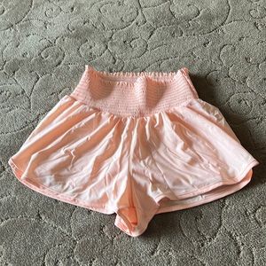This is a medium size short with knit shorts inside.